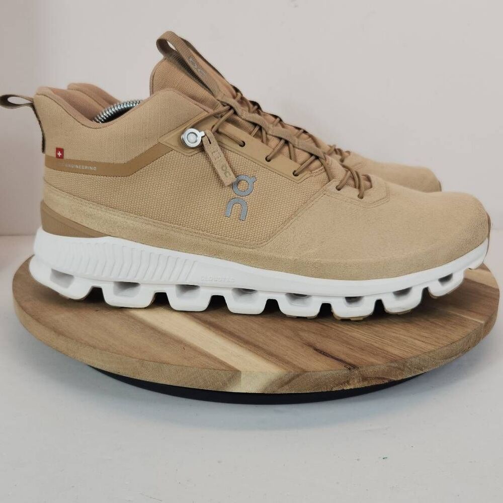 On Running Tan and White Sneakers